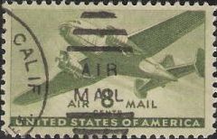Green 8-cent U.S. postage stamp picturing airplane