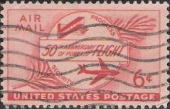 Red 6-cent U.S. postage stamp picturing airplanes
