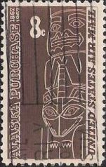 Brown 8-cent U.S. postage stamp picturing totem pole