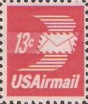 Red 13-cent U.S. postage stamp picturing winged envelope