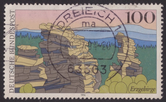 Erzgebirge 100-pfennig German postage stamp picturing Erzgebirge in the Czech Republic and Germany