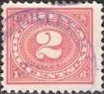 Red 2-cent U.S. revenue stamp picturing numeral '2'
