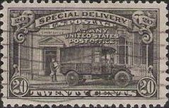 Black 20-cent U.S. postage stamp picturing post office truck