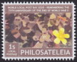 1-stamp Philosateleian Post stamp picturing yellow flower against background of brown flowers