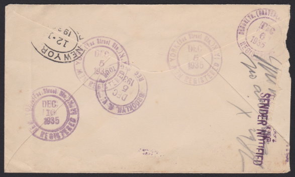 Reverse of registered cover bearing 14-cent American Indian stamp and returned to sender markings