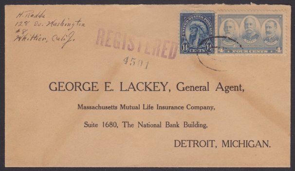 Front of stamped envelope bearing 14-cent American Indian stamp and 4-cent Sampson, Dewey, & Schley stamp