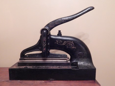 Antique postage stamp perforator