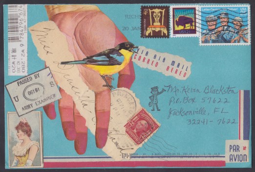 Cover bearing paper ephemera including illustration of hand