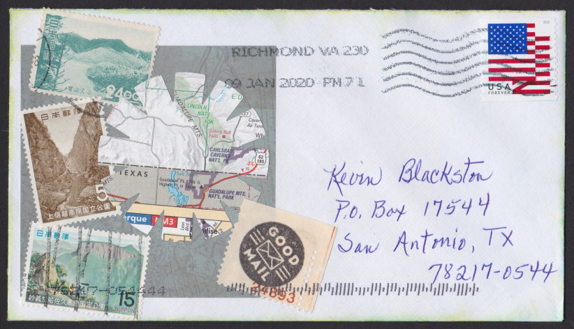 Mail art cover bearing cutout of map plus Japanese landscape stamps