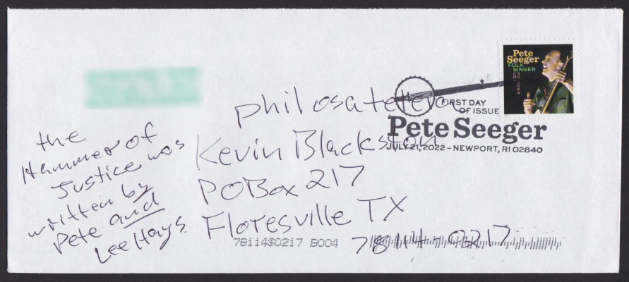 Front of first day cover bearing Pete Seeger Forever stamp