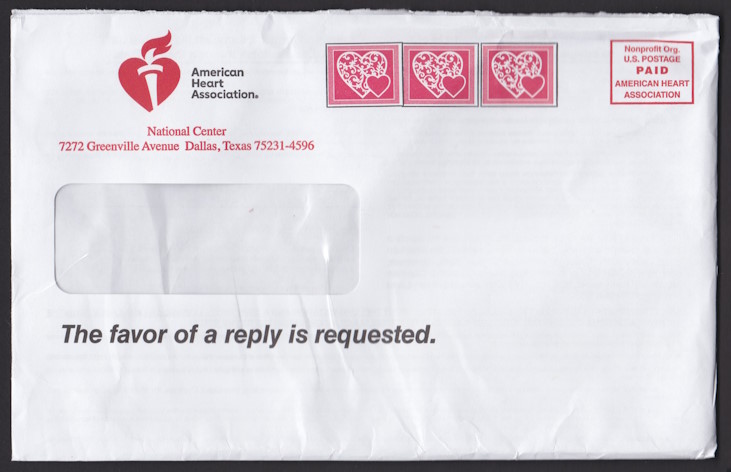 American Heart Association cover with three stamp-sized designs picturing hearts