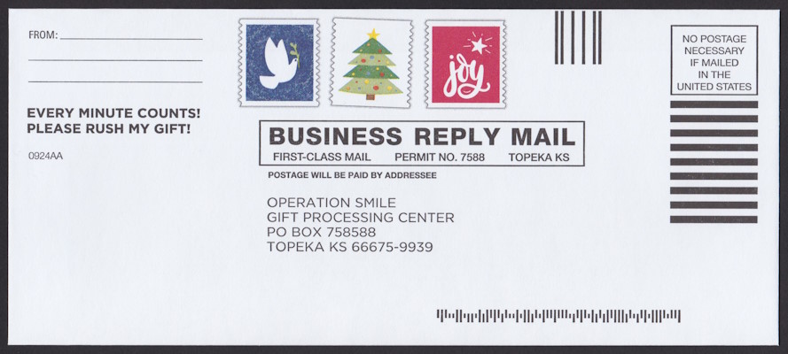 Operation Smile business reply envelope bearing three preprinted stamp-sized designs picturing dove, Christmas tree, and word “joy”