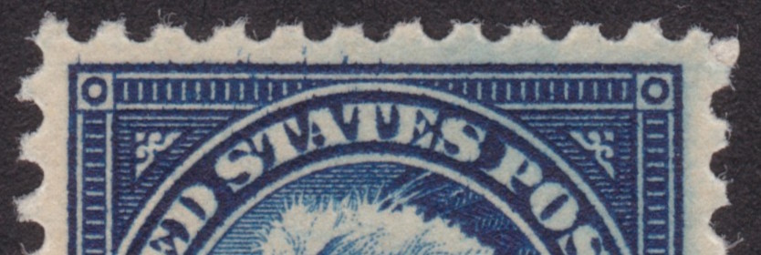 Detail of broken “E” in “STATES”