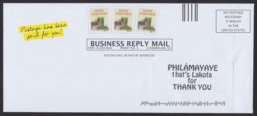 St. Joseph’s Indian School business reply envelope with three preprinted stamp-sized Christmas designs