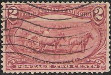 2¢ Farming in the West Dark red 2-cent U.S. postage stamp picturing horses and plow