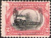 Red & black 2-cent U.S. postage stamp picturing locomotive & train cars