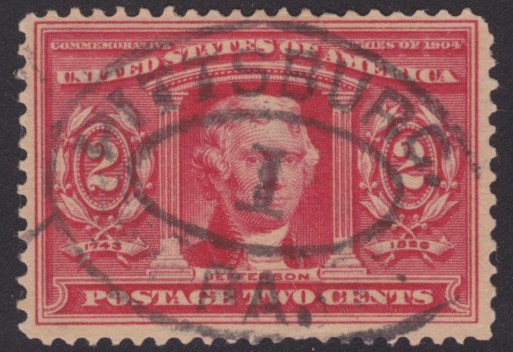 Red 2-cent U.S. postage stamp picturing Thomas Jefferson