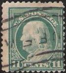 Blue green 11-cent U.S. postage stamp picturing Benjamin Franklin