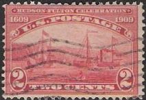 Red 2-cent U.S. postage stamp picturing ships
