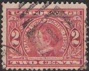 Red 2-cent U.S. postage stamp picturing William Seward