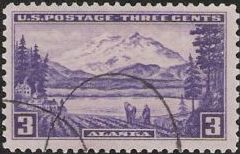 Purple 3-cent U.S. postage stamp picturing Mount McKinley