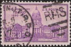Purple 3-cent U.S. postage stamp picturing the Idaho State Capitol