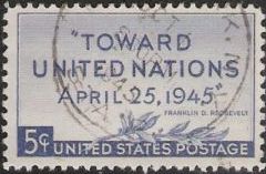 Blue 5-cent U.S. postage stamp picturing phrase 'Toward United Nations April 25, 1945'