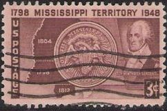 Brown 3-cent U.S. postage stamp picturing Mississippi Territory seal, outlines of Mississippi and Alabama, and Winthrop Sargent