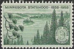 Green 3-cent U.S. postage stamp picturing lake