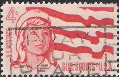Red 4-cent U.S. postage stamp picturing girl and flag