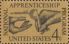 Black and yellow 4-cent U.S. postage stamp picturing hands