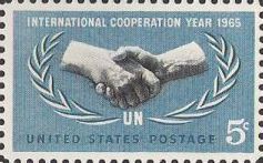 Blue and black 5-cent U.S. postage stamp picturing clasped hands