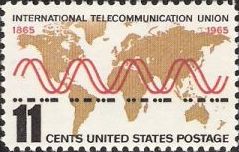11-cent U.S. postage stamp picturing world map, radio waves, and Morse code