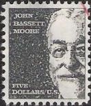 Gray black $5 U.S. postage stamp picturing John Bassett Moore