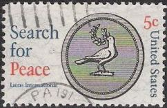 5-cent U.S. postage stamp picturing bird with sprig