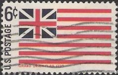 Blue and red 6-cent U.S. postage stamp picturing Grand Union flag