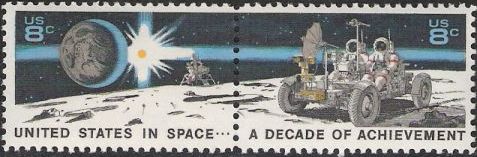 Pair of 8-cent U.S. postage stamps picturing astronauts on moon