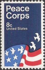 Blue and red 8-cent U.S. postage stamp picturing American flag and doves