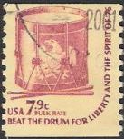 Dark red 7.9-cent U.S. postage stamp picturing drum