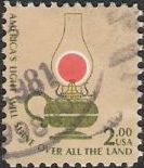 $2 U.S. postage stamp picturing kerosene lamp