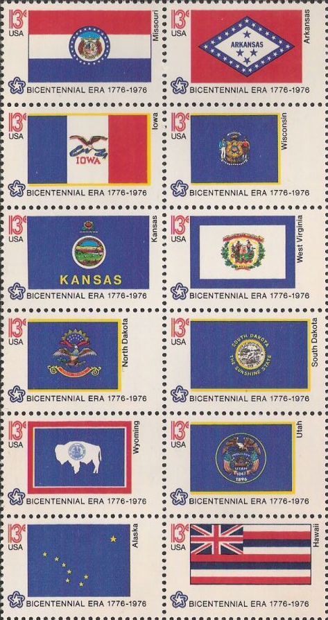 Block of 12 13-cent U.S. postage stamps picturing state flags of Missouri, Arkansas, Iowa, Wisconsin, Kansas, West Virginia, North Dakota, South Dakota, Wyoming, Utah, Alaska, and Hawaii