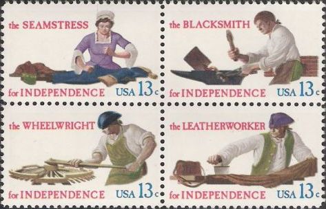 Block of four 13-cent U.S. postage stamps picturing seamstress, blacksmith, wheelwright, and leatherworker