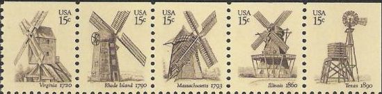 Strip of five brown & yellow 15-cent U.S. postage stamps picturing windmills