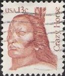 Maroon 13-cent U.S. postage stamp picturing Crazy Horse