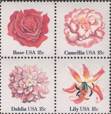 Block of four 18-cent U.S. postage stamps picturing flowers