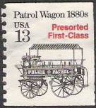 Black & red 13-cent U.S. postage stamp picturing patrol wagon