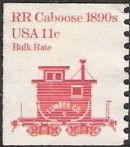 Red 11-cent U.S. postage stamp picturing railroad caboose