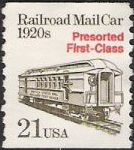 Olive & red 21-cent U.S. postage stamp picturing railroad mail car