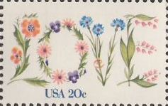20-cent U.S. postage stamp picturing flowers arranged in the shape of word 'Love'