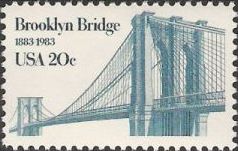 Blue 20-cent U.S. postage stamp picturing Brooklyn Bridge